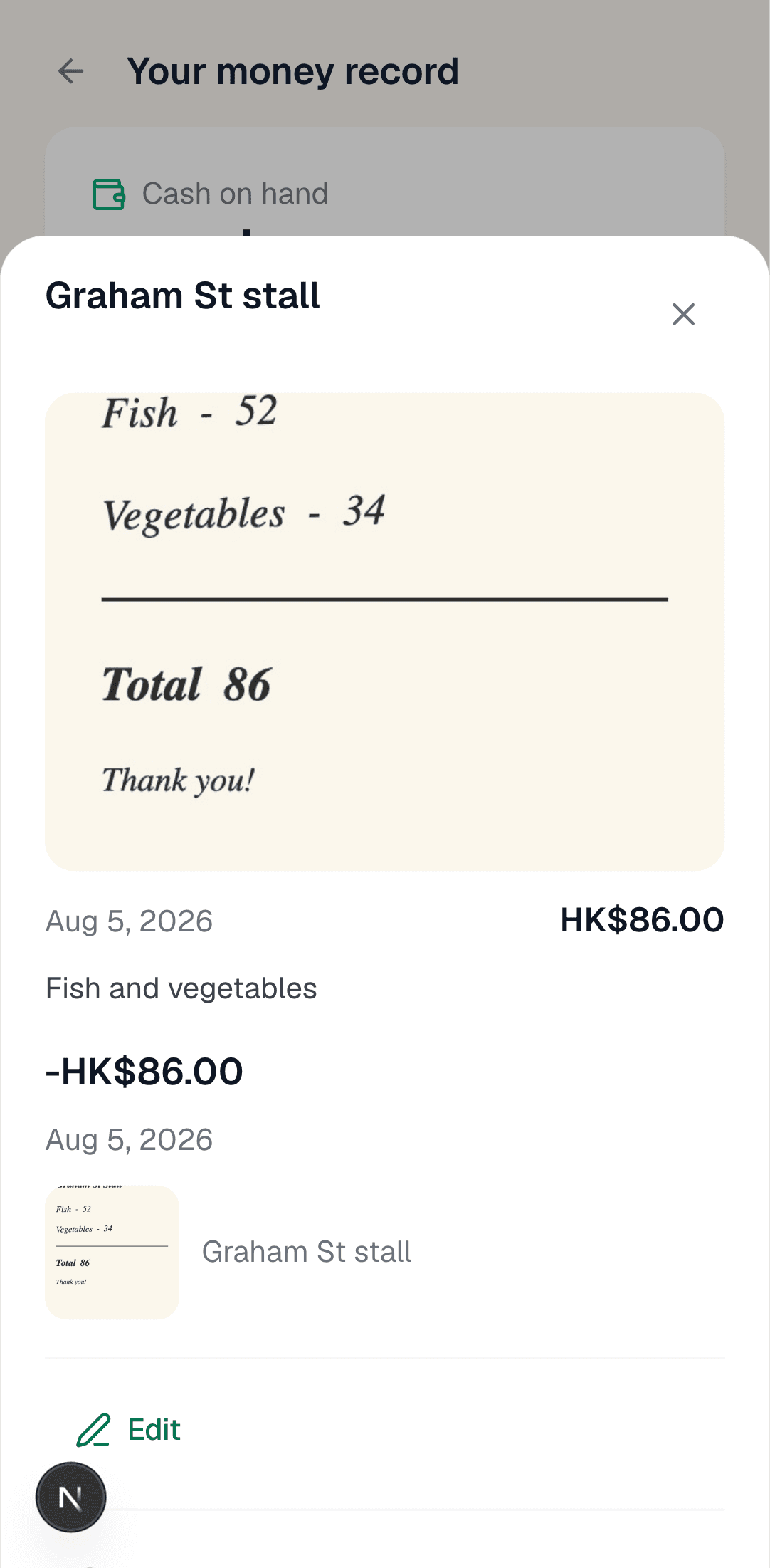 A handwritten stall note photographed into SamaKasa — fish 52, vegetables 34, total 86 — kept as a HK$86.00 spend from Graham St stall with the helper's note beside it.